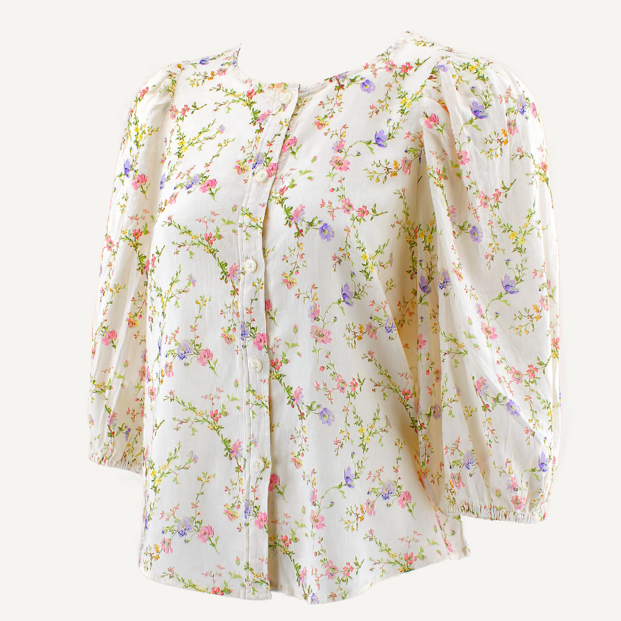 A still preview of the Marvify 3D Twin viewer showing a floral puff-sleeve blouse. Click to start the interactive viewer.
